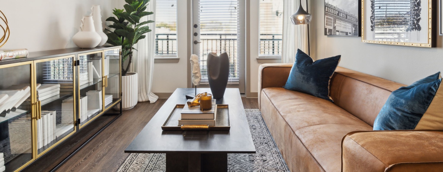 natural lighting fills living room with private balcony access