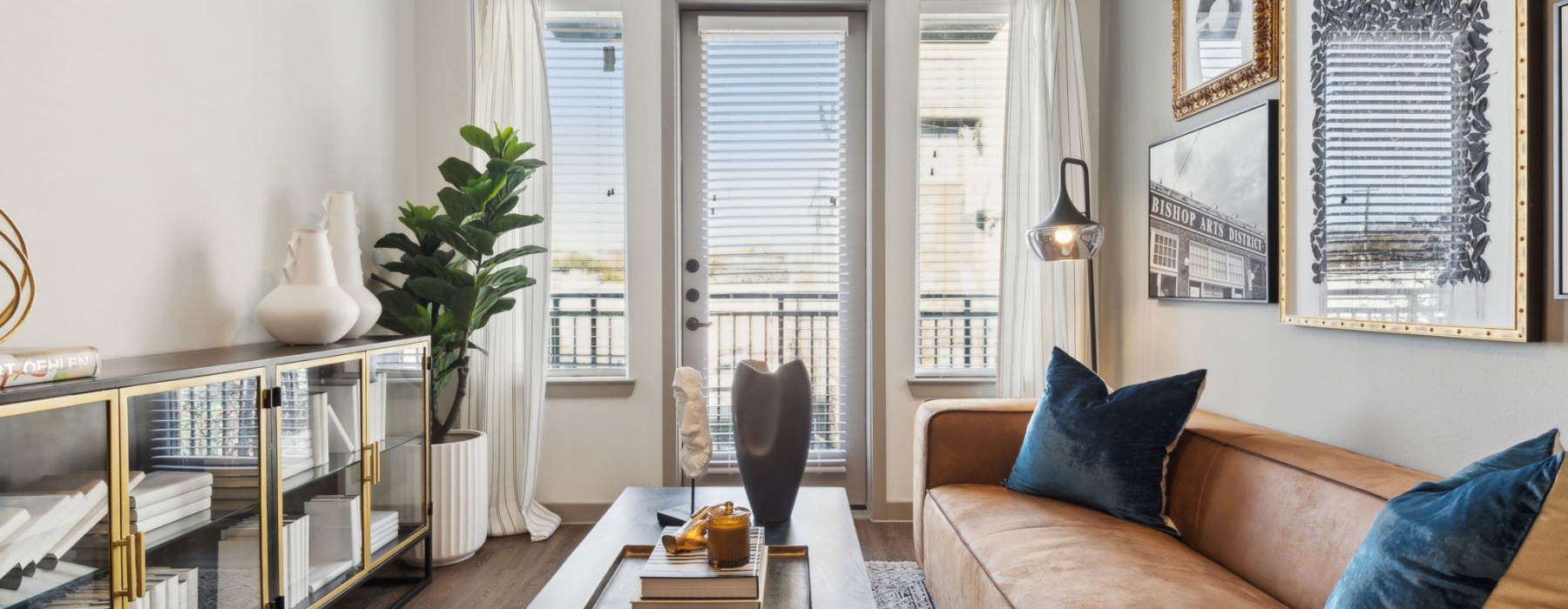 natural lighting fills living room with private balcony access